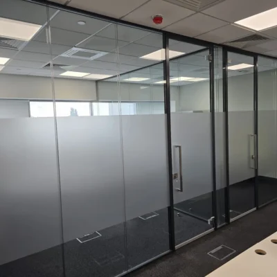 Bespoke Double Glass Partitioning reducing the noise.