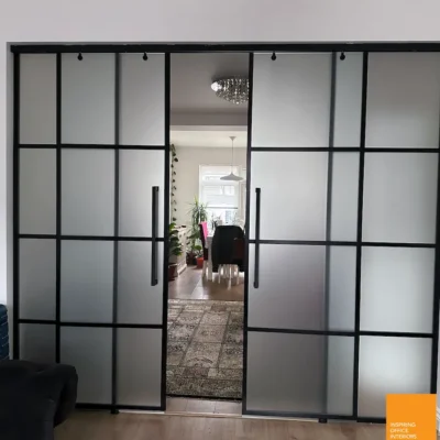 Sliding Glass Room Divider Enclosing Living Room