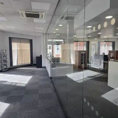 Long Frameless Glass partition creating a practical and contemporary internal space for an educational environment.