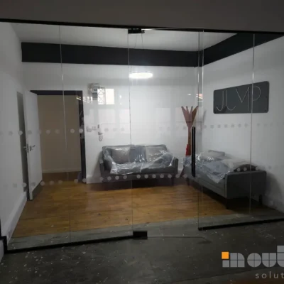 Frameless Glass Partition Wall with Glazed Door and Manifestation Dots