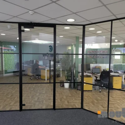 Industrial Glass Wall with Framed Glass Door