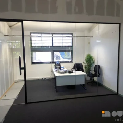 Glass Partitions with Solid Bulkhead Above