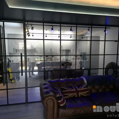 Black Framed Glass Wall with Frameless Glass Door