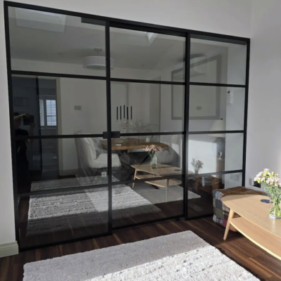 Bespoke Glass Room Divider with Sliding Glass Door.