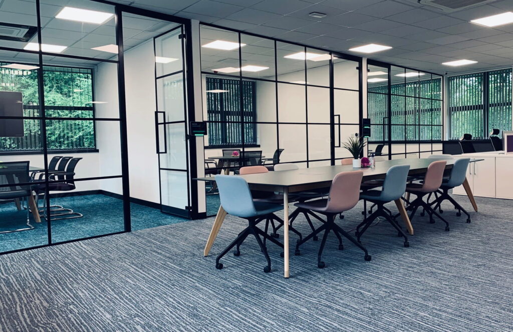 Industrial Glass Partitions with Framed Glass Doors